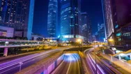 Night View Of Modern City Traffic Across Street. Time Lapse. Hong Kong Stock Footage
