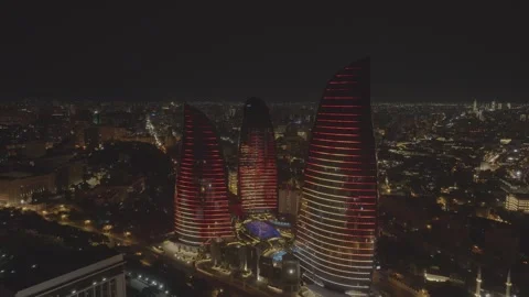 Night View of Modern Skyscrapers with Changing Red and Orange Lights Stock Footage 341882534