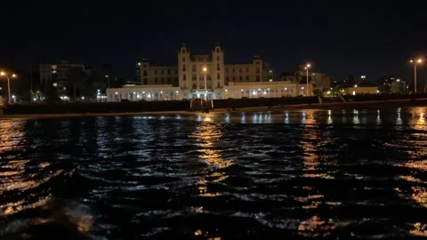Night View of Montevideo Building Reflected on Water in Uruguay Stock Footage 346908595
