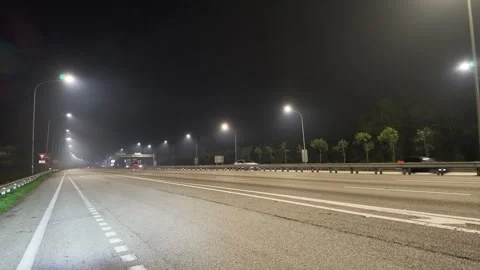 A night view of a multi-lane highway in Malaysia Stock Footage 340861835