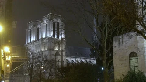 Night View Of The Notre Dame Cathedral In Paris, France Stock Footage 158681623