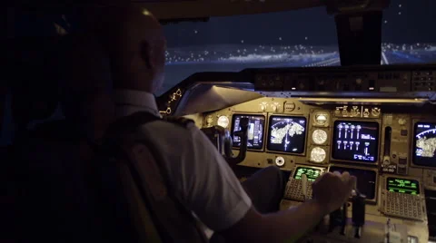 Night view as pilot lands jumbo jet at San Francisco HD Stock Footage