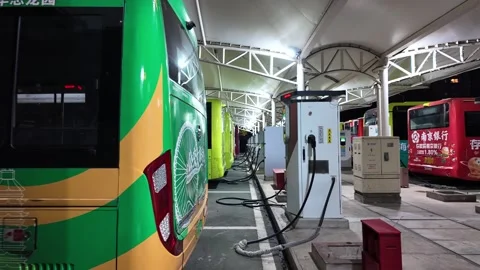 Night view of a public bus charging station. Video stock 330883850