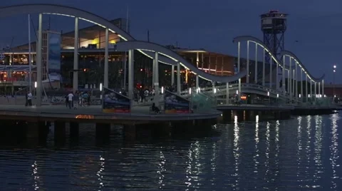 Night view of Rambla de Mar, footbridge modern design in the port of Barcelona. Stock Footage 50711244