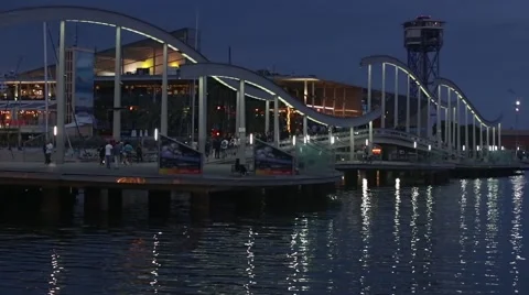 Night view of Rambla de Mar, footbridge modern design in the port of Barcelona. Stock Footage 50711361