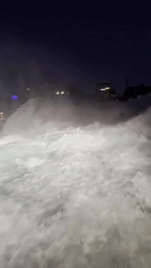 Night view of Rhine Falls area with illuminated riverside in Schaffhausen Stock Footage 338202294