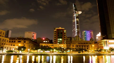 Night view of the river and the Bitexco tower in Ho Chi Minh City Stock Footage 64581442