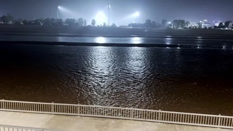 Night View of River Water in City with Flood Lights Vidéo 344554912