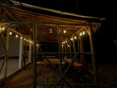 Night View of Rustic Bamboo Pavilion with Heart Decor at Tanjung Lesung Beach Stock Photos
