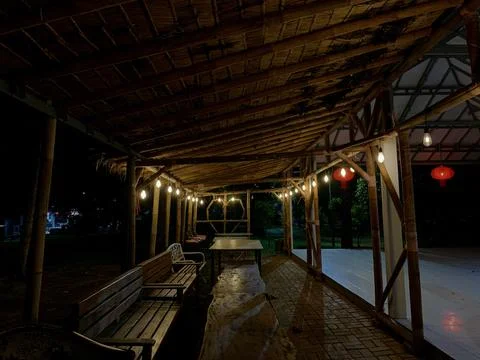Night View of Rustic Bamboo Pavilion with Lanterns at Tanjung Lesung Beach Stock Photos