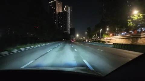 A night view seen from a moving car. Video stock 341800864