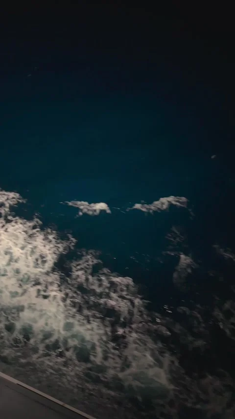 Night View of Ship Wake on the Ocean Surface Stock Footage 328220209