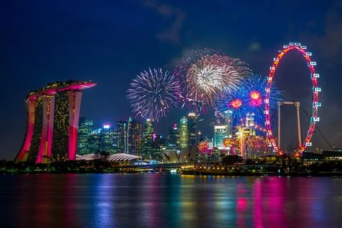 Night view of singapore with firework Фото