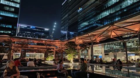 Night view of software IT company in high-tech city, hyderabad. employees are sp Stock Photos