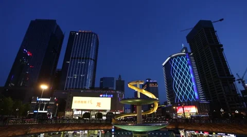 Night view of Tianfu Square central business district in the blue hour, Chengdu, Stock Footage 63259960