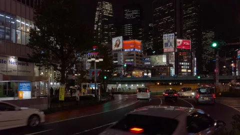 Night view of traffic passing under Omekaido Overbridge in Shinjuku Stock-Footage 150611557