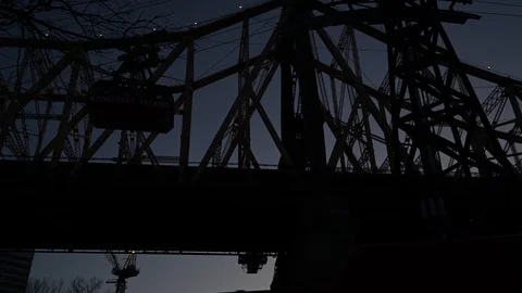 Night view of tramway car as it glides back to Manhattan in New York City, Stock Footage 103247060