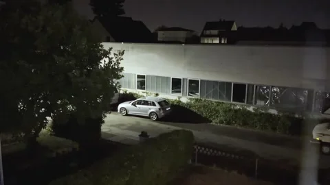 Night View from an Upper Window Over a Quiet Residential Street 库存影片 341178953
