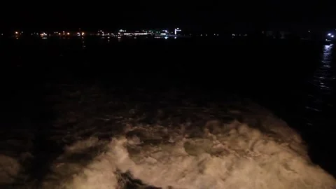Night view of a wake behind a boat Stock Footage 157294380