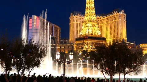 Night view of the water dance performance of Bellagio Hotel and Casino Stock Footage 103967261