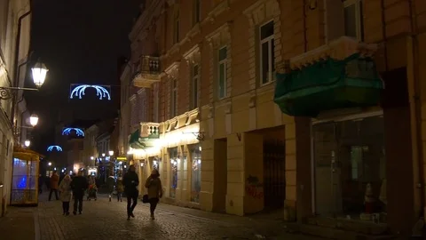 Night vilnius old town city center street walking panorama 4k lithuania Stock Footage