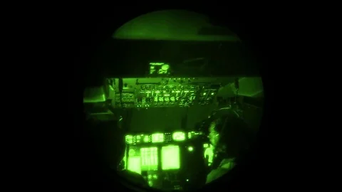 Night vision imagery of pilots flying C-130J Hercules  Vídeo Stock 89609522