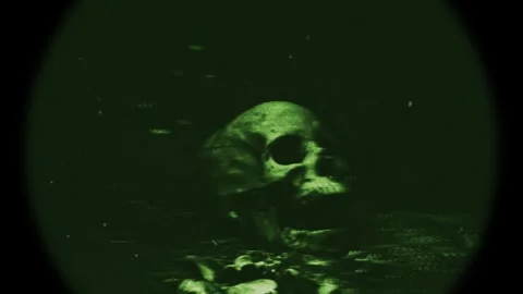 Night vision skull glowing in eerie green tones, emerging from the dark. Stock Footage 318782002