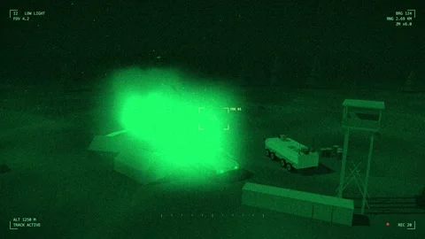 Night vision tracks a stick of bombs hitting armoured vehicle park 库存影片 342333457