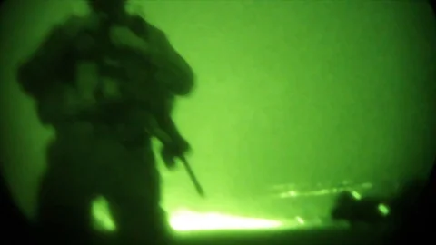 Night vision of US army troops during a special mission in Afghanistan Stock-Footage 86295687