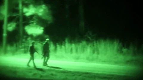 Night vision view of soldiers patrolling grounds Stock-Footage 84308024