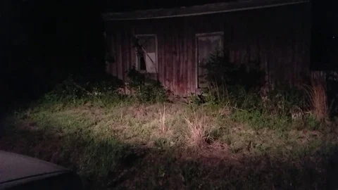 Night walk with Creepy Barn Stock Footage