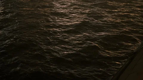 Night waves in city river, dark color, ripples Video stock 296773499
