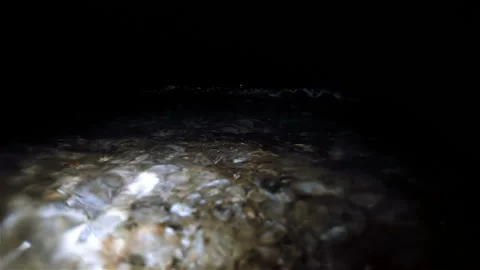 Night waves underwater Stock Footage 100663380