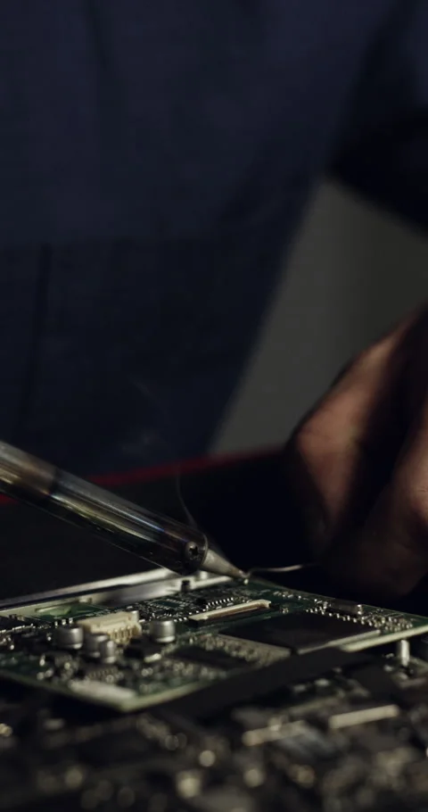 Night, welding and hands of person with motherboard for IT maintenance, repair Stock Footage 330056022