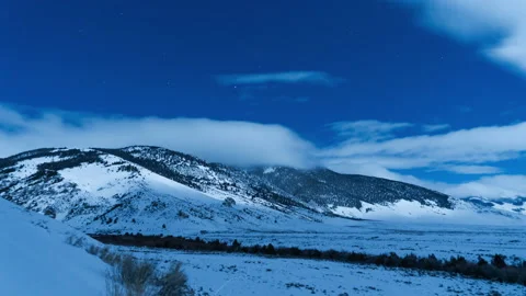 Night winter landscape lit by full moon timelapse 動画素材 167035810