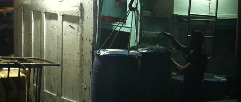 Night work on the pier to unload the boat Video stock 232855008