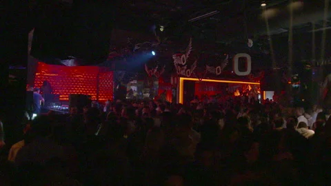 Nightclub Crowd Dancing Under Strobe Lights and Laser Beams Stock Footage 344608505
