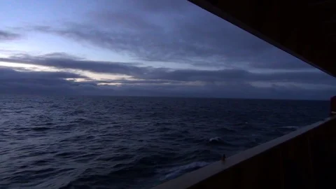 Nightfall on the Arctic Ocean seen from a ship deck Stock Footage 104872317