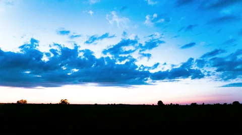 Nightfall with beautiful clouds and  dark earth. 4K 4096x2304 . Without birds Stockbeeldmateriaal 53129781
