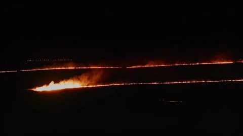 Nightfall Firestorm Sweeping Through Field. Aerial Drone Shot. Stock Footage 257762379