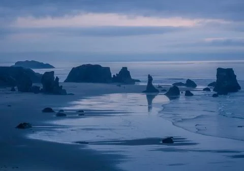 Nightfall on the lonely beach Stock Photos