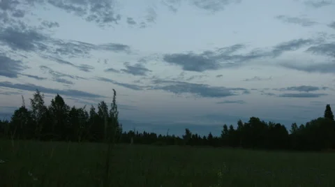 Nightfall over a field Stock Footage 49155772