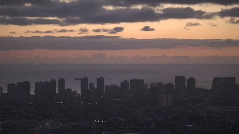 Nightfall Timelapse Over the Honolulu Skyline in 4k Stock Footage 104370632