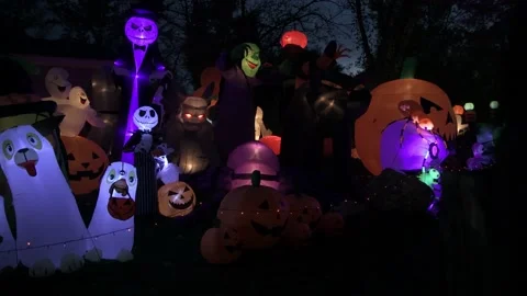 Nightime lighted Halloween display. Video stock 203854082