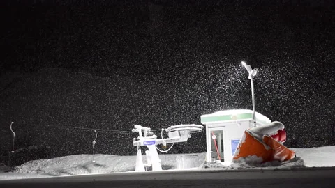 Nightime snowing in ski resort Stock Footage 233530341