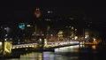 Nightlife of shiny capital of muslim country, illuminated bridge, life in hurry HD Footage