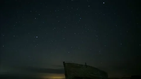 Nightscape timelapse of old, decrepit abandoned boat at Dungeness. Stock Footage 238774498