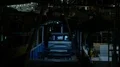 Nightshot blue illuminated tour boats in a domestic indonesian harbor HD Footage