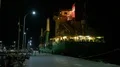 Nightshot container ship docking at domestic indonesian harbor HD Footage