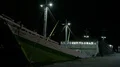 Nightshot old primitive freight ship in a domestic indonesian harbor HD Footage